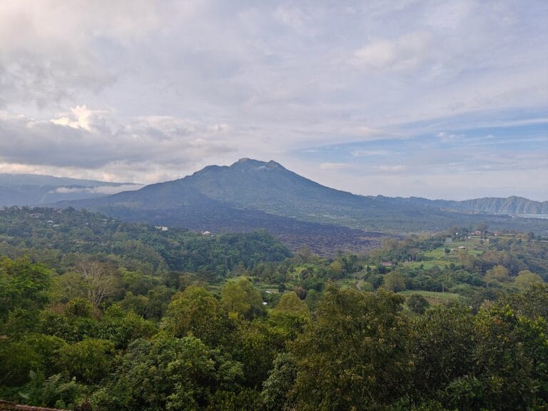 Mount Batur sunrise view with Lake Batur in Kintamani.
